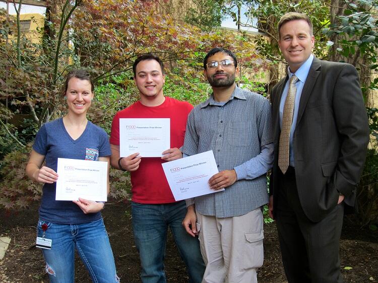 Brandt (right) with the winners of the F1000 poster awards at the 2014 University of Oklahoma Health Sciences Center’s Graduate Research Education And Technology (GREAT) Symposium.
